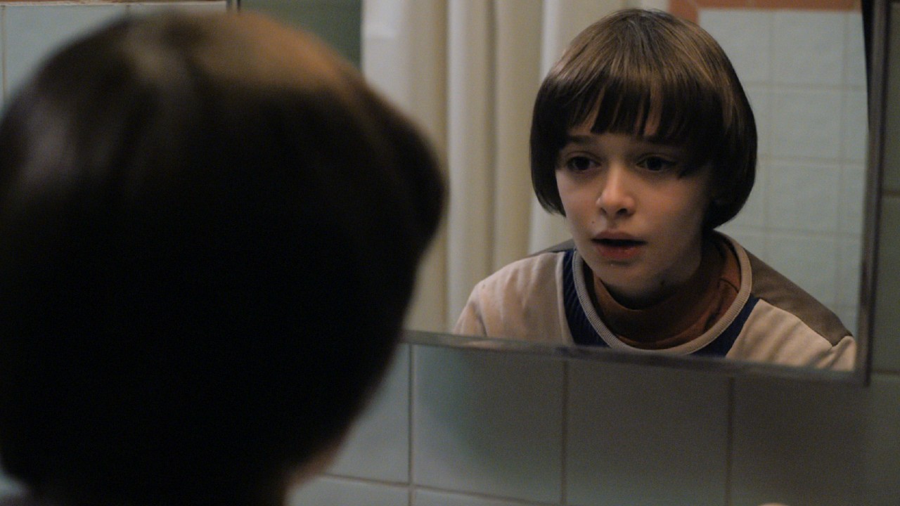 Will looking in a mirror in Stranger Things Season 1 finale.