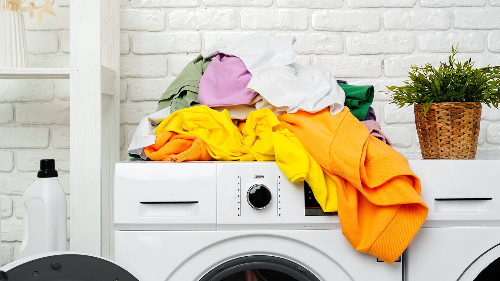 Clothes on top of a washing machine