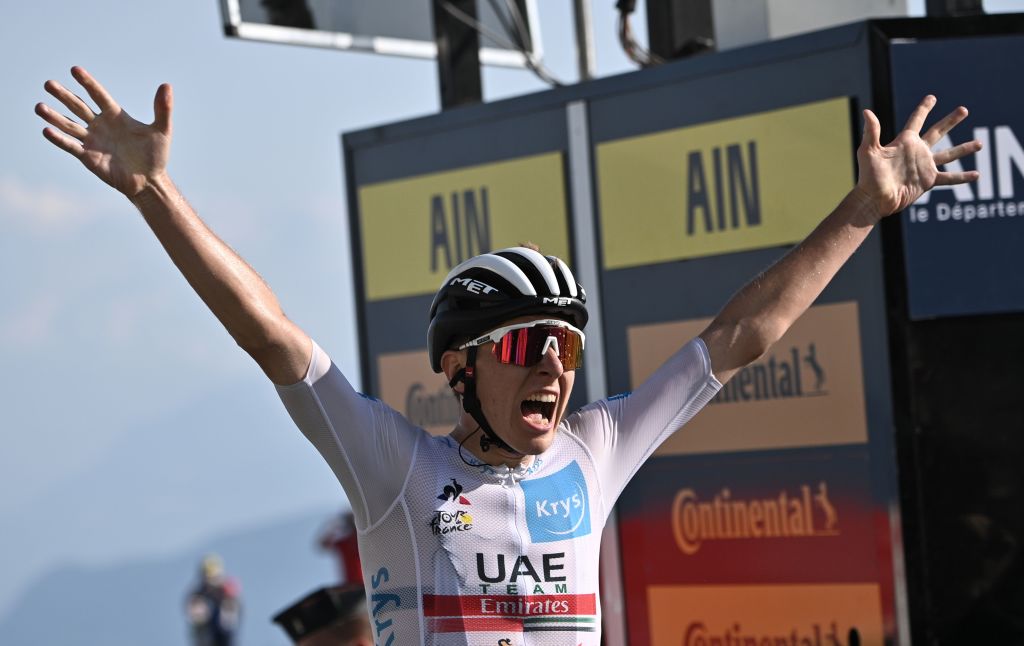 Stage winner Team Jumbo rider Team UAE Emirates rider Slovenias Tadej Pogacar celebrates as he crosses the finish line at the Grand Colombier pass during the 15th stage of the 107th edition of the Tour de France cycling race 175 km between Lyon and Grand Colombier on September 13 2020 Photo by AnneChristine POUJOULAT POOL AFP Photo by ANNECHRISTINE POUJOULATPOOLAFP via Getty Images