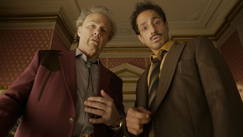 Tom Cruise's Digger Rockwell and Riz Ahmed's Ganesh looking down into the camera in Digger