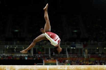 Simone Biles competes on the balance beam at the 2016 Rio Olympics