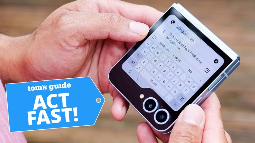 Galaxy Z Flip 6 held in the hand for texting.