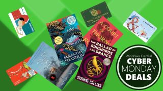 Image of various books and Barnes & Noble gift cards on a green background for Cyber Monday.