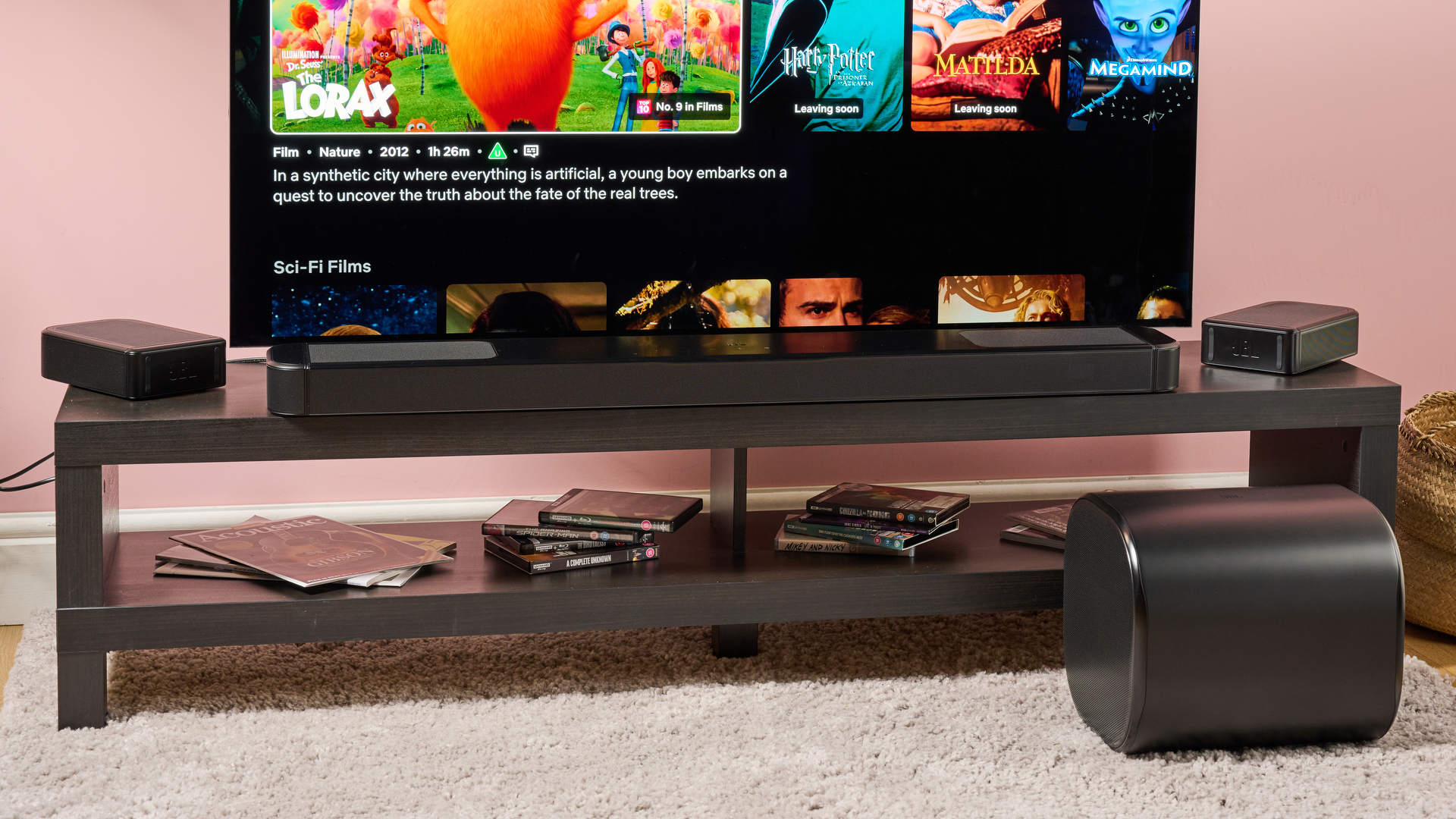 JBL Bar 1300MK2 soundbar surround speakers and sub alongside TV setup