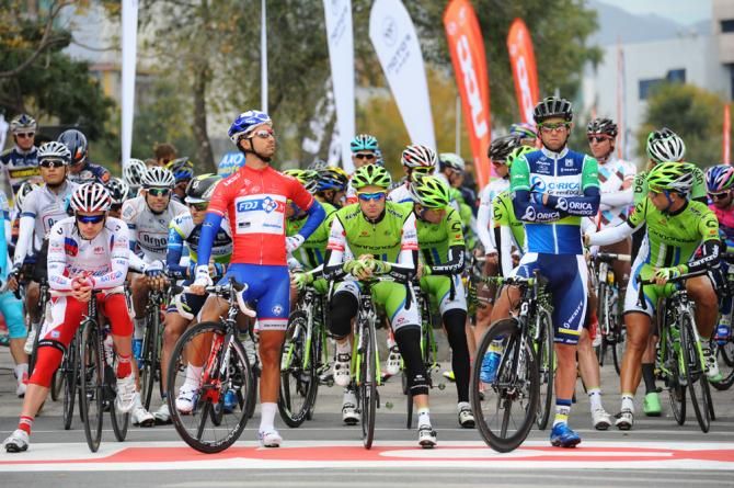 Riders in leading jerseys at the start