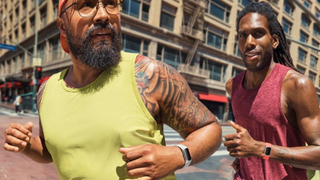 Men running with the Fitbit Charge 6