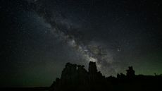 Photo of the Night Sky showing the thick band of the Milky Way streaking across the heavens