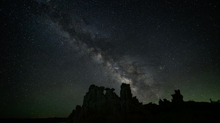 Photo of the Night Sky showing the thick band of the Milky Way streaking across the heavens