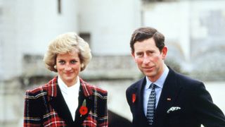 Charles and Diana, Prince and Princess of Wales, pose outside Chateau de Chambord during their official visit to France on November 9, 1988 in Chambord, France