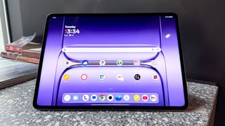 OnePlus Pad 3 on granite worktop, on home screen