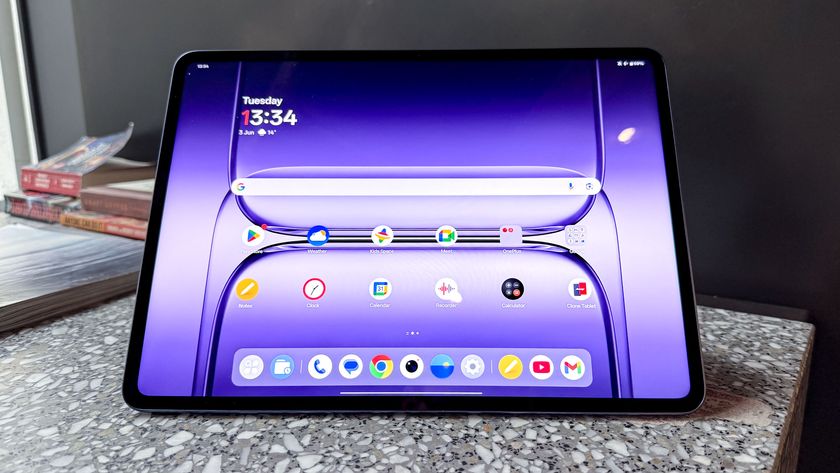 OnePlus Pad 3 on granite worktop, on home screen