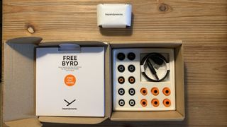 The Beyerdynamic Free Byrd earbuds in their open delivery box