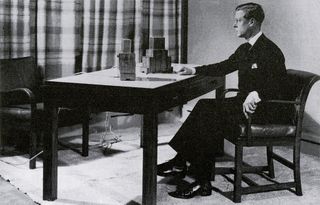 HM king edward VIII on a Parker Knoll chair