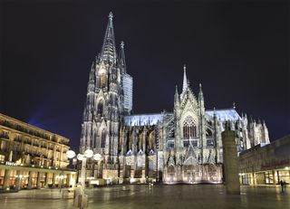 About 50 million Germans identify as Christians. The Cologne Cathedral was begun in 1248. It was not completed until 1880, and was the world's tallest building (516.4 feet / 157.38 meters) until 1884, when the Washington Monument was built.