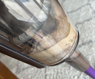 A closeup of the fine dirt picked up by the Dyson Gen5detect