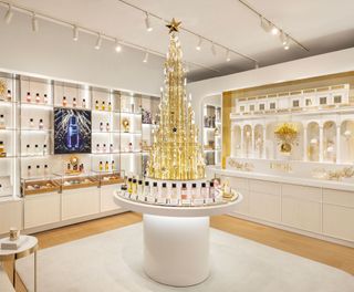 a photo of the inside of a new Dior perfume boutique in New York City