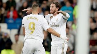 Karim Benzema and Sergio Ramos celebrate a goal for Real Madrid in October 2019.