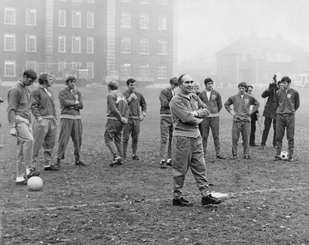 England manager Alf Ramsey (1920 - 1999, foreground) with players during a training session at Roehampton, London, 9th December 1969. The team is preparing for a match against Portugal at Wembley. (Photo by Central Press/Hulton Archive/Getty Images)