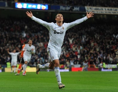 MADRID, SPAIN - DECEMBER 04: Cristiano Ronaldo of Real Madrid celebrates scoring his sides opening goal during the La Liga match between Real Madrid and Valencia at Estadio Santiago Bernabeu on December 4, 2010 in Madrid, Spain. (Photo by Jasper Juinen/Getty Images)