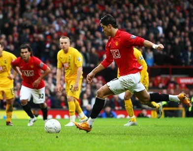 MANCHESTER, UNITED KINGDOM - JANUARY 27: Cristiano Ronaldo of United scores his teams 2nd goal from the penalty spot during the FA Cup spnsored by E.ON 4th Round match between Manchester United and Tottenham Hotspur at Old Trafford on January 27, 2008 in Manchester, England. (Photo by Alex Livesey/Getty Images)
