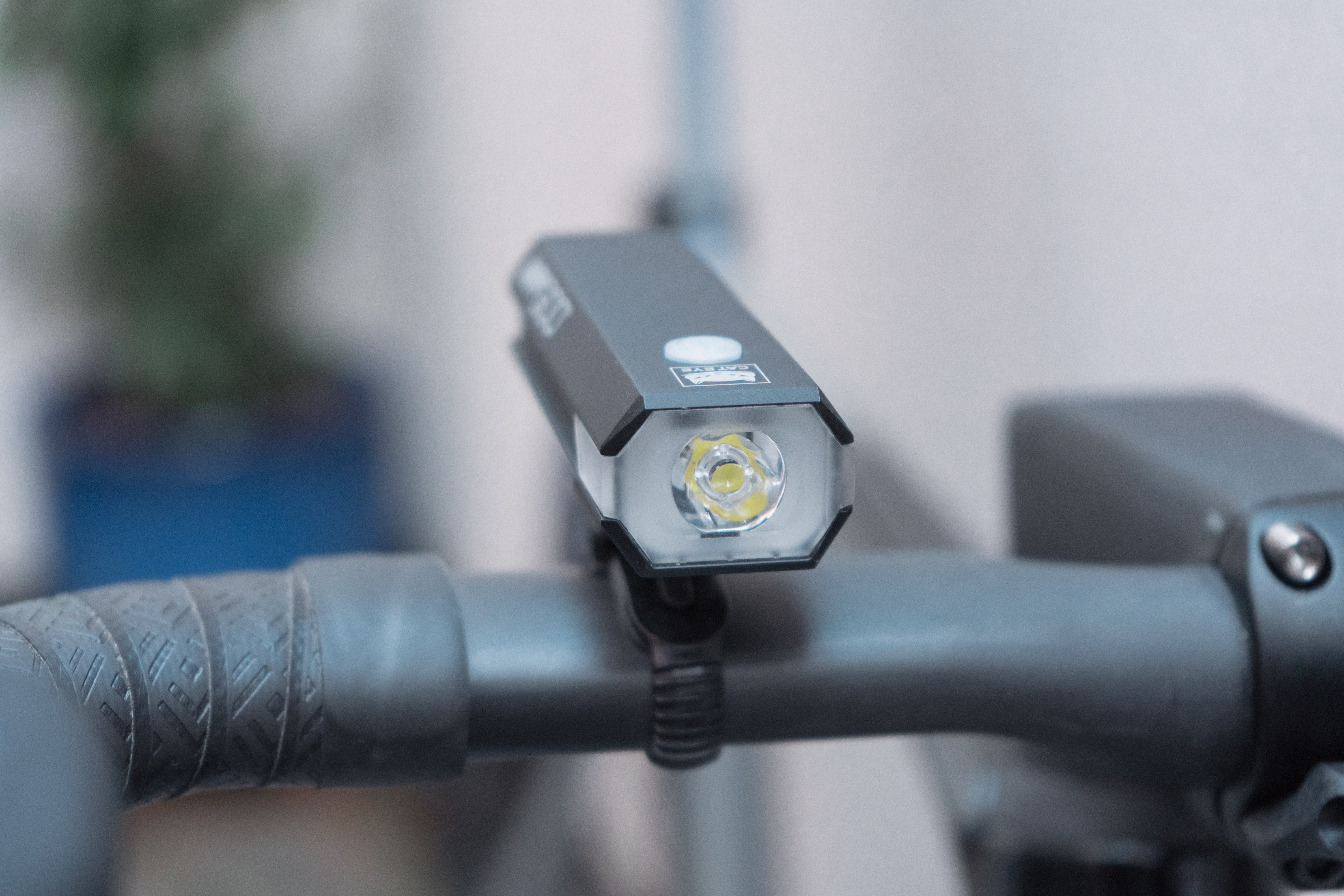 A front view of a bike light showing a single LED bulb