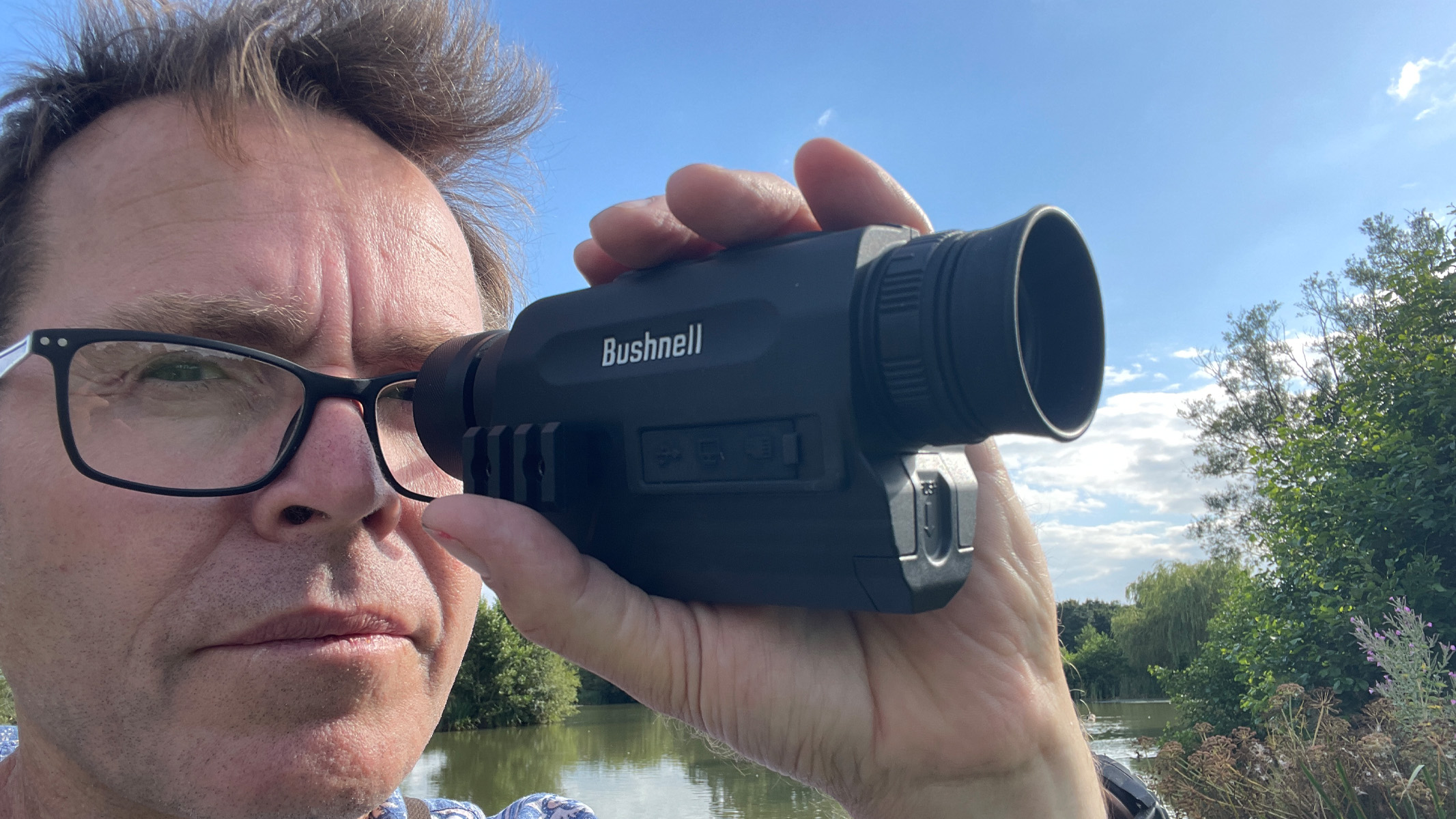 Man using the Bushnell Equinox X650 Night Vision 5x32 Monocular