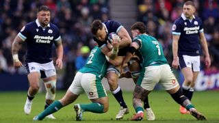 Jack Dempsey of Scotland is tackled by Andrew Porter and Ronan Kelleher of Ireland during Six Nations match between Scotland and Ireland.