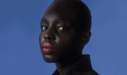 Close up of model wearing red lipstick