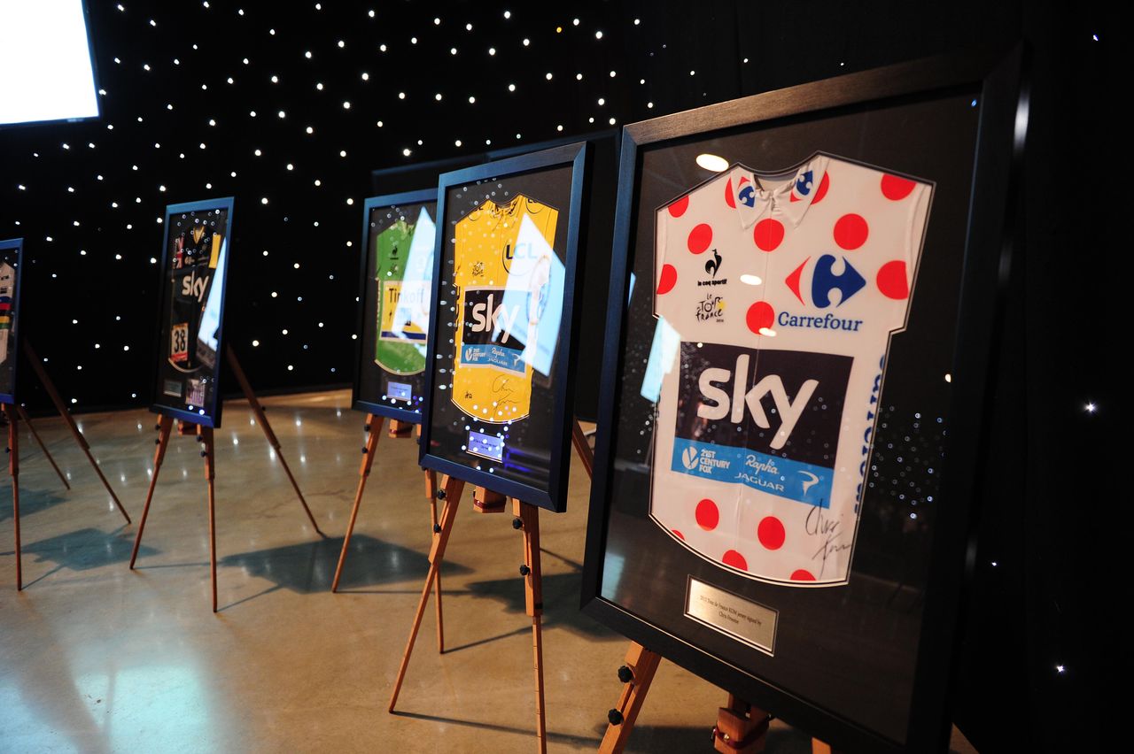 Chris Froome's yellow and polka dot jerseys from the Tour de France, signed, were up for grabs in the auction