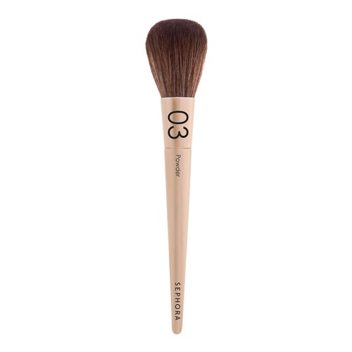 Beige coloured makeup brush with 03 written on it with brown bristles