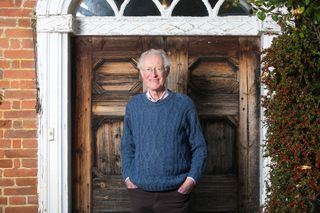 Bamber Gascoigne outside his Surrey home, which also appears in BBC comedy, Ghosts.