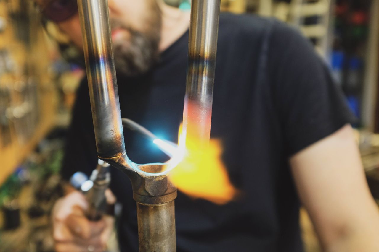 Paul Gibson of Ellis Briggs brazing a fork crown