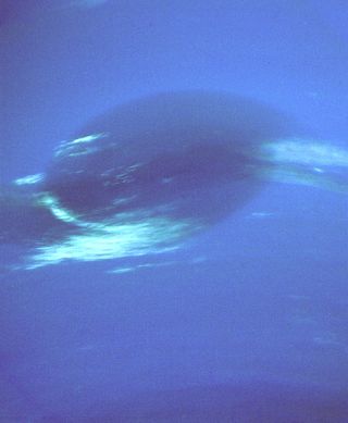 Neptune's Great Dark Spot. This was the spot seen by Voyager. It had disappeared from the planet's southern hemisphere by the time the Hubble Space Telescope looked for it in 1994, only to be replaced later by a dark spot in the northern hemisphere.