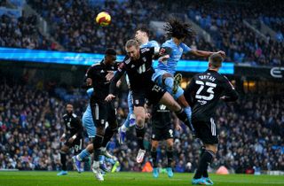 City’s John Stones (centre) scored from a corner against Fulham