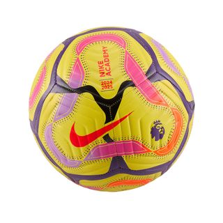 A yellow football with small black, red and purple patterns on it has a red Nike tick in the centre and a small purple lion's head.