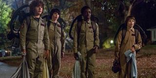 The Stranger Things boys in Ghostbusters costumes