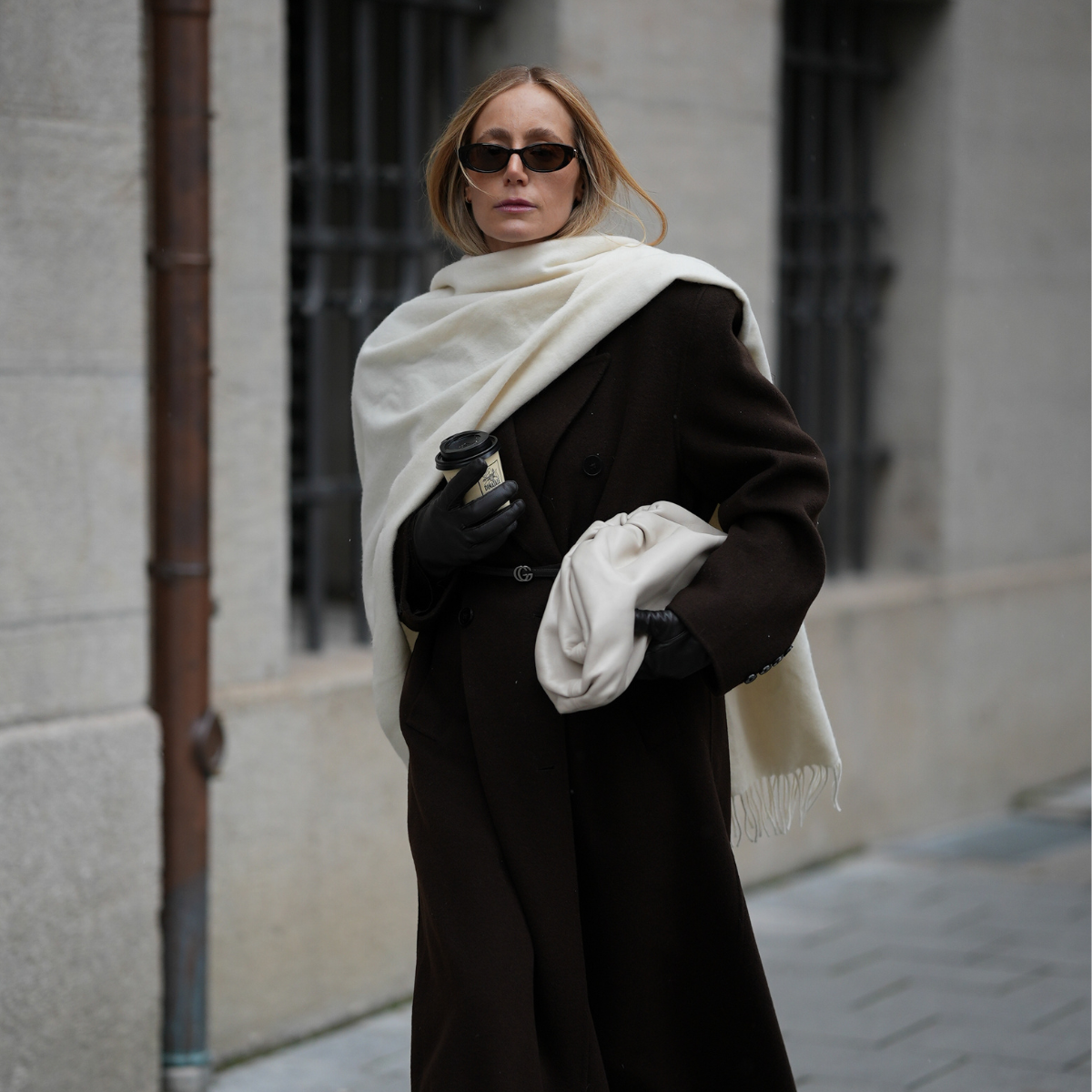 Fashion week attendee wears oversize cashmere scarf