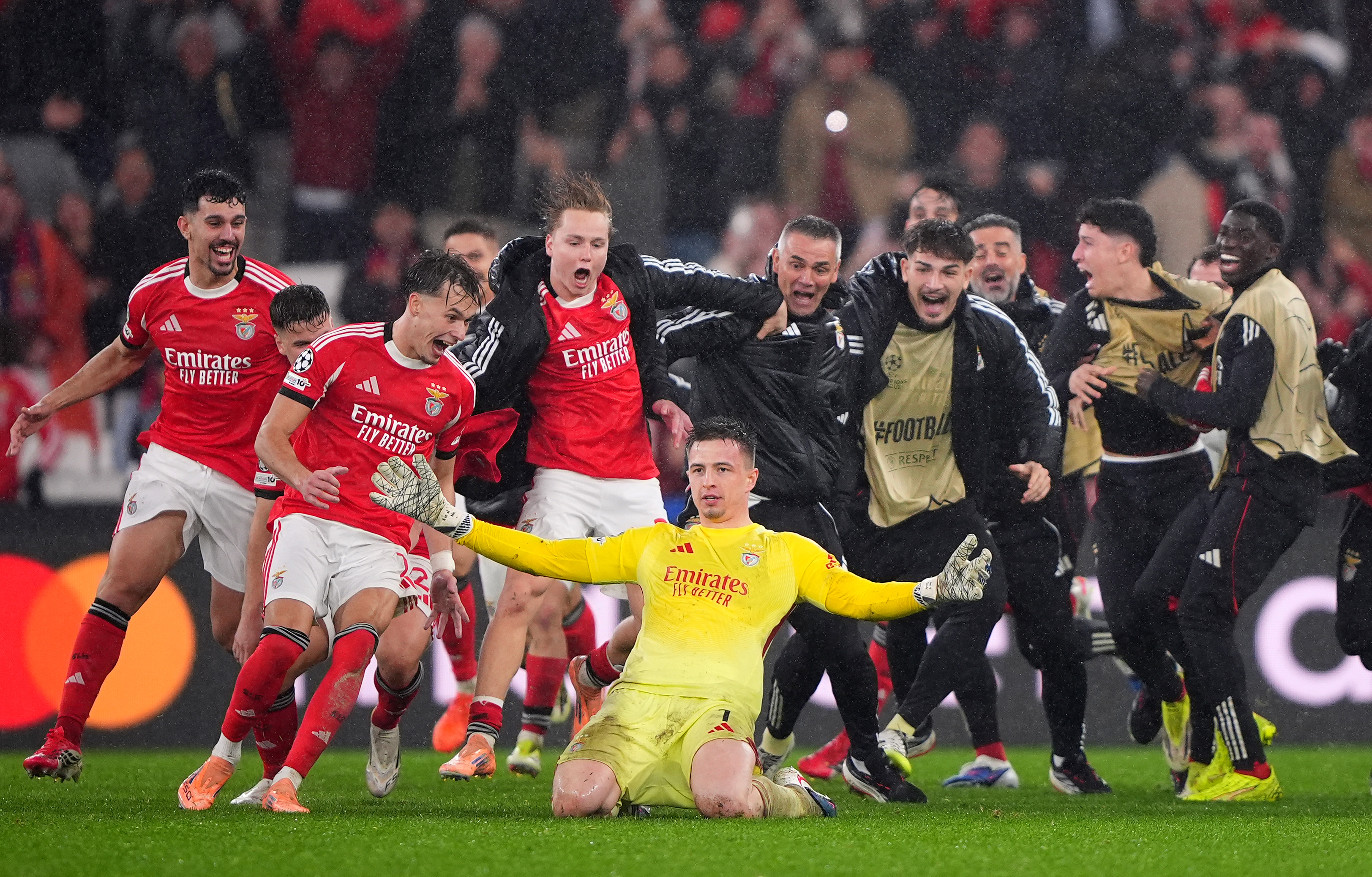 Anatoliy Trubin celebrates scoring a header to send Benfica through to the knockout rounds of the Champions League