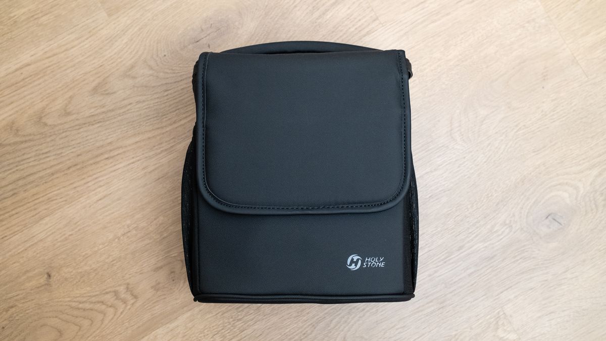 Holy Stone HS600D drone carry case on a wooden floor