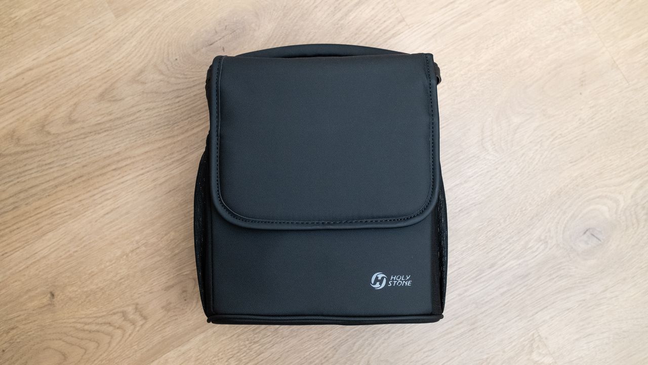 Holy Stone HS600D drone carry case on a wooden floor
