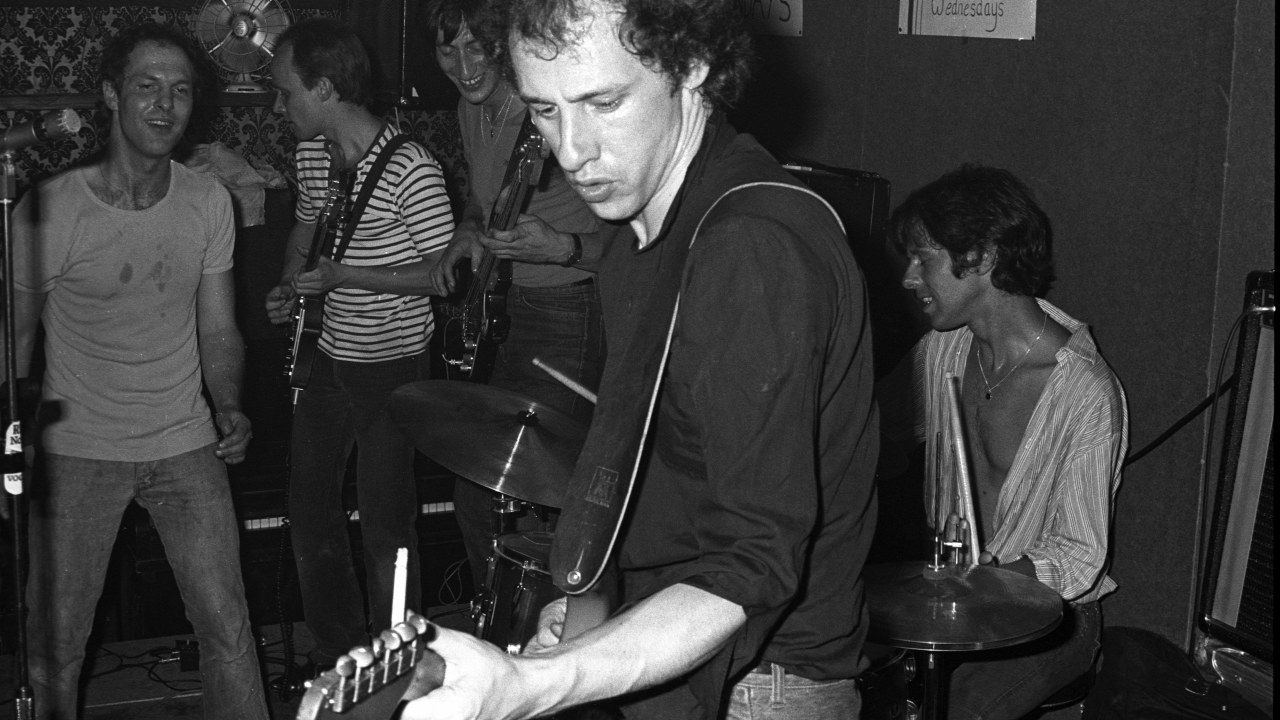 Dire Straits, Members, Albums, & Facts