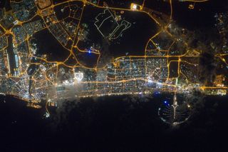 The city lights of Dubai, in the United Arab Emirates, shine in this photo taken from the International Space Station on Feb. 22, 2012.