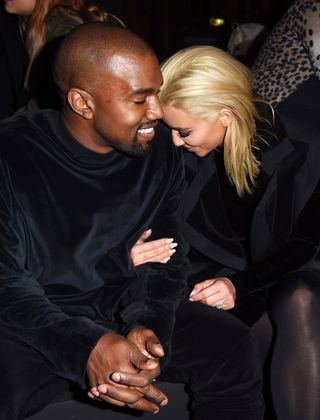 Kim Kardashian And Kanye West Front Row At Paris Fashion Week AW15