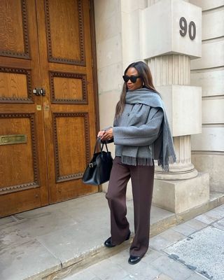 Symphony of silk in brown trousers and scarf jacket