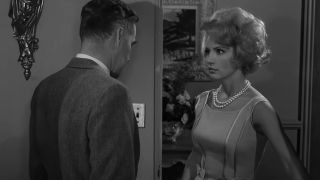 man and a woman speaking to each other in The Twilight Zone episode A Short Drink From A Certain Fountain