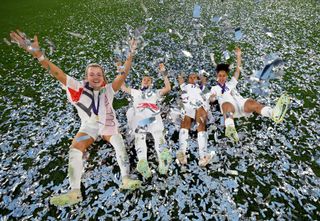 Lauren Hemp, Lucy Bronze, Nikita Parris and Demi Stokes of England celebrate following the UEFA Women's Euro 2022 final match