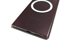 Mock Qi2 MagSafe ring on a Samsung Galaxy S22 Ultra