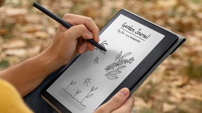 Amazon Kindle Scribe review: woman drawing on Kindle Scribe ereader