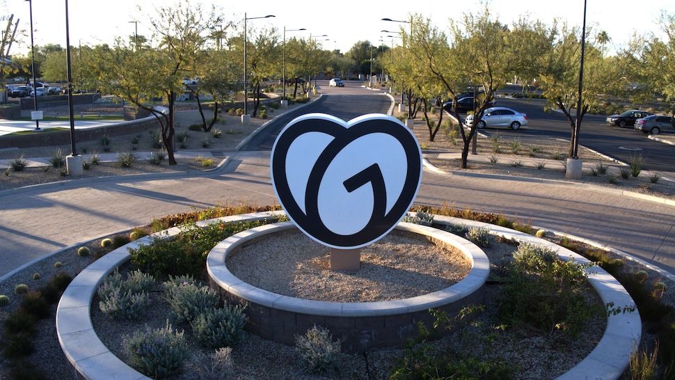 GoDaddy logo statue at GoDaddy office