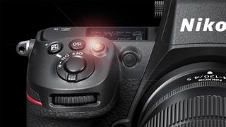 Nikon Z8 close-up on black background with lens flare over record button